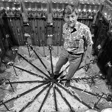 the image shows John b Calhoun standing inside the mouse enclosure during the 1962 experiment