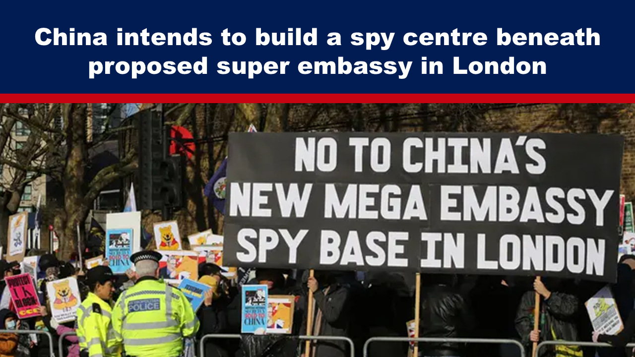 Expose News: Crowd protesting in London against China’s proposed super embassy and alleged spy centre plans, voicing concerns and holding signs.