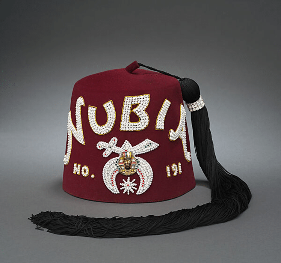 Expose News: Mystical Nubia fez with ornate design, linked to debates on Freemasonry and Islam. Could Dr. Bill Schneobelen have the answers? - The Expose Expose News: Mystical Nubia fez with ornate design, linked to debates on Freemasonry and Islam. Could Dr. Bill Schneobelen have the answers?