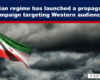 Expose News: Dramatic skies over an Iranian flag as the regime launches a propaganda push aimed at Western audiences.