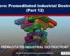 Colorful stacked blocks labeled with various industries (Aircraft, Cars, Plastics, Chemicals, Steel, etc.) in front of an industrial skyline and wind turbines; hero image for an article titled 'Net Zero: Premeditated Industrial Destruction (Part 12)'.
