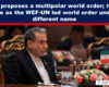 On a BRICS news banner, a man in a dark suit sits at a conference table with microphones and an Iranian flag nearby.