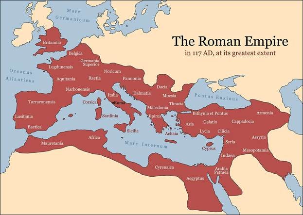 Historic map of the Roman Empire at its greatest extent in 117 AD, showing red territory across Europe, North Africa, and the Middle East.