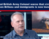 News interview with Col. (Ret.) Richard Kemp CBE discussing civil-war risk in Britain on i24 News set.