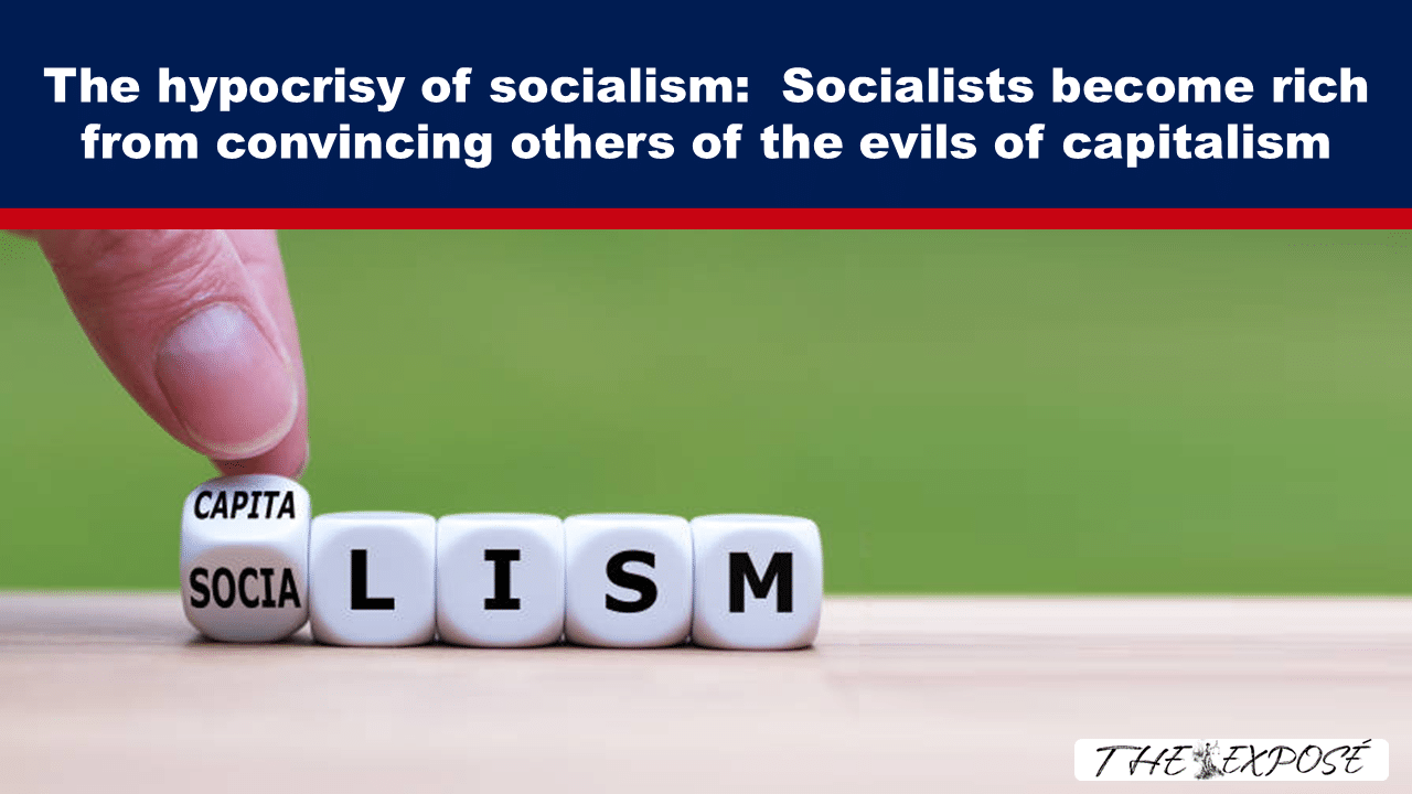 Headline about socialism hypocrisy; close‑up of a hand placing a dice block reading 'CAPITA' atop dice forming 'SOCIALISM' with a green background and The Exposé logo in corner.