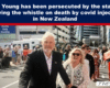 Crowd of protesters marching down a city street, led by a man in a dark suit; signs call out about Covid injections and whistleblowing in New Zealand.