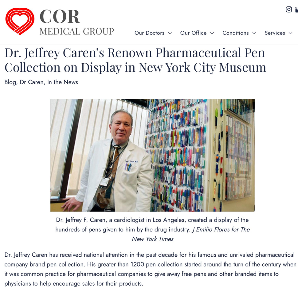 Dr. Jeffrey F. Caren, a cardiologist, in a white coat posing beside a wall of assorted pens on display.