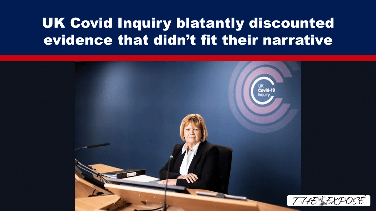 JulFeat18a - The Expose Woman in a suit seated at a curved briefing desk with microphones and papers, a UK Covid-19 Inquiry logo on a blue wall behind her.