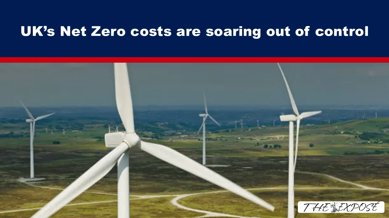 JulFeat21 - The Expose Header image for article showing a wind farm under a dark blue banner that reads 'UK’s Net Zero costs are soaring out of control'.