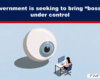 Illustration of a giant eye watching a person at a desk computer, symbolizing government oversight of bossware; headline about the UK proposal.